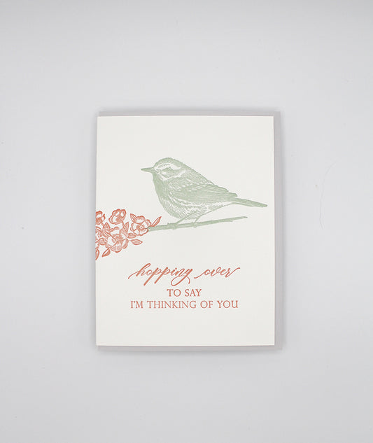 Letterpress friendship card with a bird that says "Hopping over to say I'm thinking of you" by Rust Belt Love