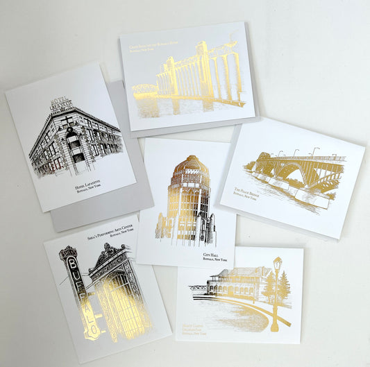 Array of gold foil Buffalo landmark cards by Rust Belt Love