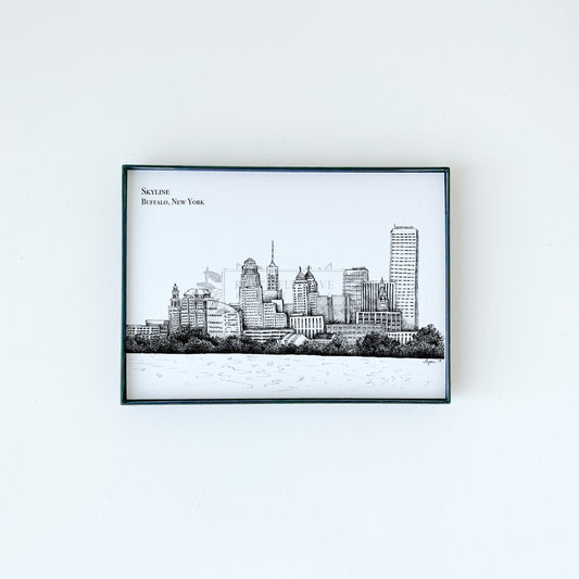 Buffalo skyline illustration in black ink on white paper by Rust Belt Love