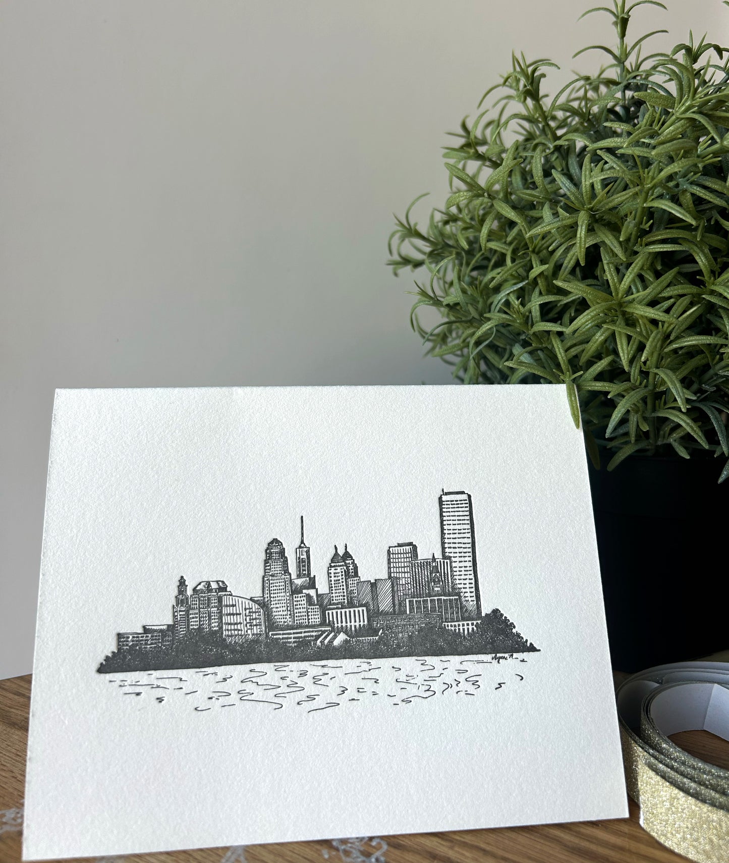 Style shot of letterpress greeting card with Buffalo skyline from Rust Belt Love