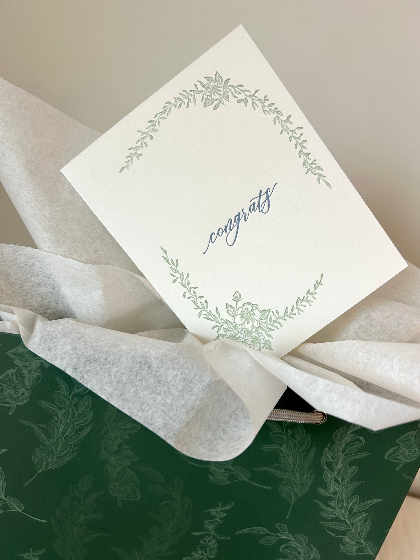 Letterpress congrats card with greenery that says "Congrats" in the middle by Rust Belt Love