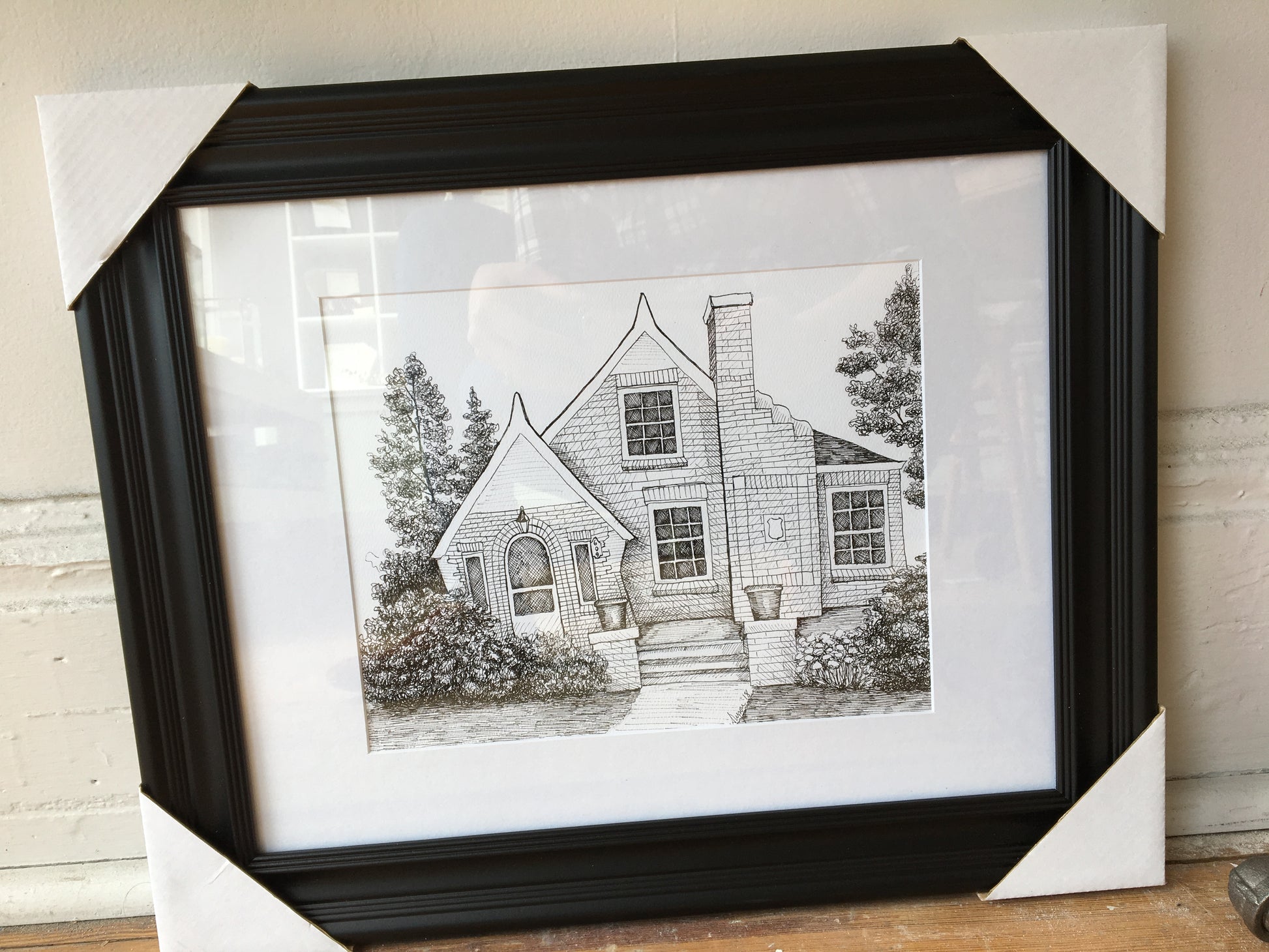 Framed illustration of a custom drawn home by Rust Belt Love