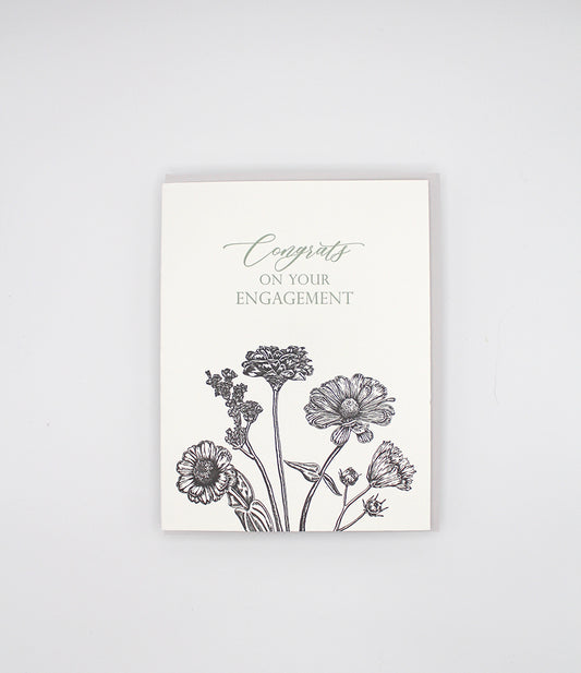 Letterpress congrats card with black florals that says "Congrats on your engagement" by Rust Belt Love