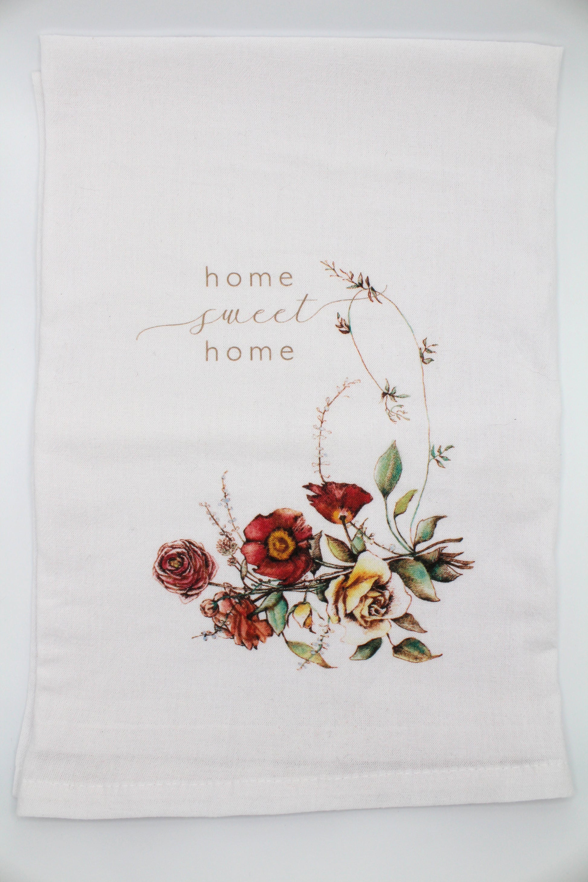 White Tea Towel with florals that says "home sweet home" by Rust Belt Love