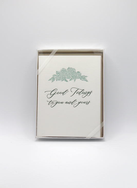 Rust Belt Love's boxed holiday set with holiday letterpress cards that read "Good Tidings to you and yours".