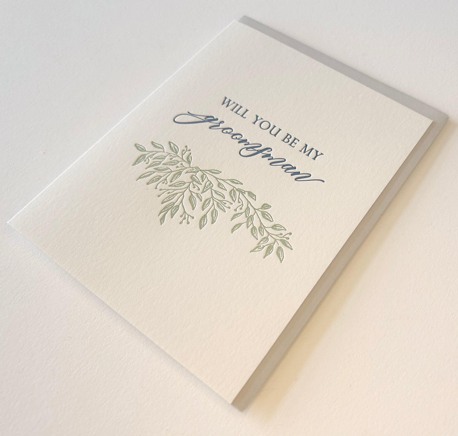 Letterpress wedding card with florals that says " Will You Be My Groomsman" by Rust Belt Love