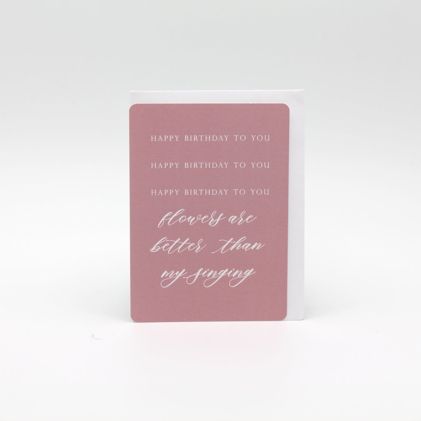 Digital pink minicard that reads "Happy birthday to you happy birthday to you happy birthday to you flowers are the better than my singing" by Rust Belt Love