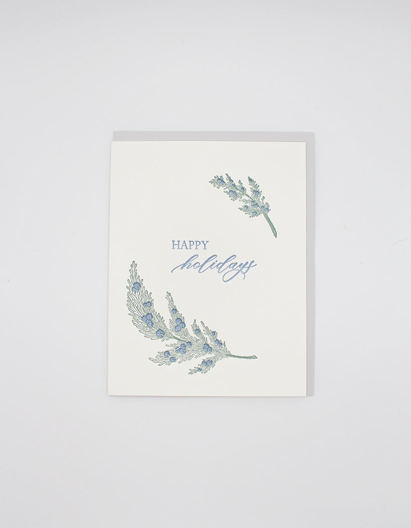 Letterpress holiday card with greenery that says "Happy Holidays" by Rust Belt Love