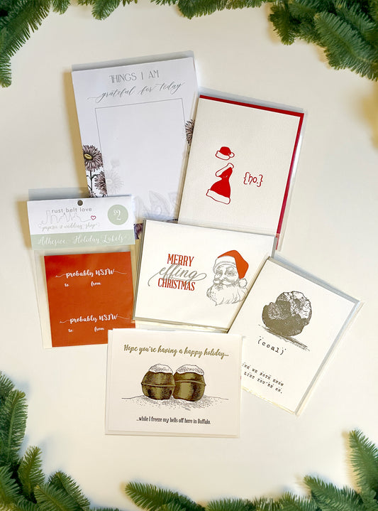 An array of Rust Belt Love's first line of holiday letterpress cards.