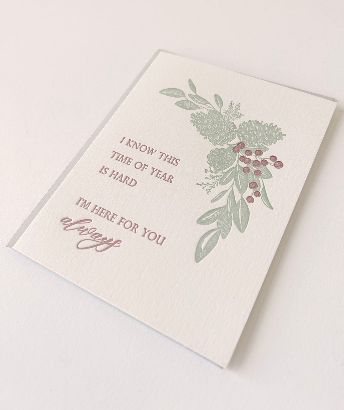 Letterpress holiday card with pinecones that says " I Know This Time Of Year Is Hard I'm Here For You Always" by Rust Belt Love