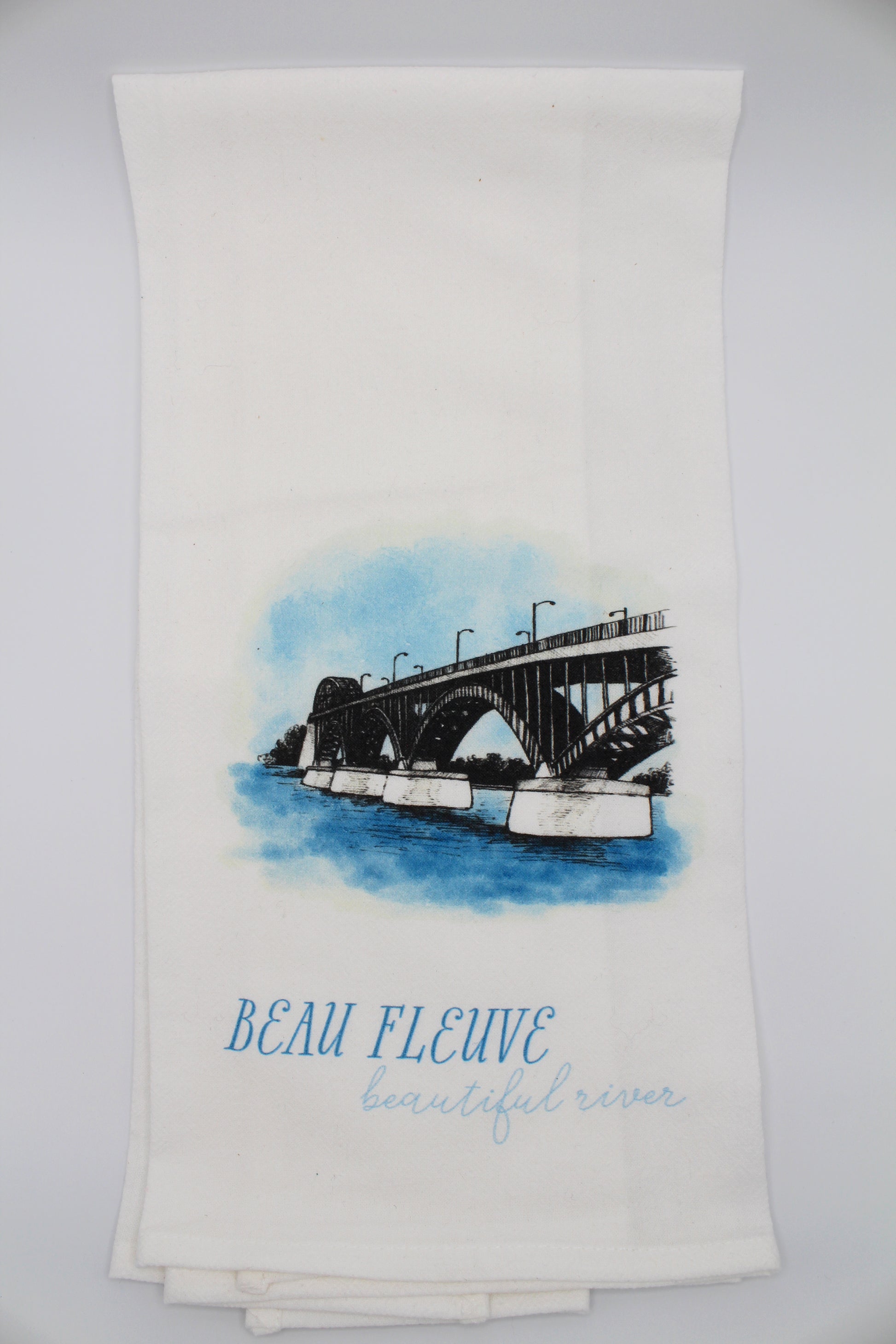 White Tea Towel with peace bridge illustration that says "beau fleuve beautiful river" by Rust Belt Love