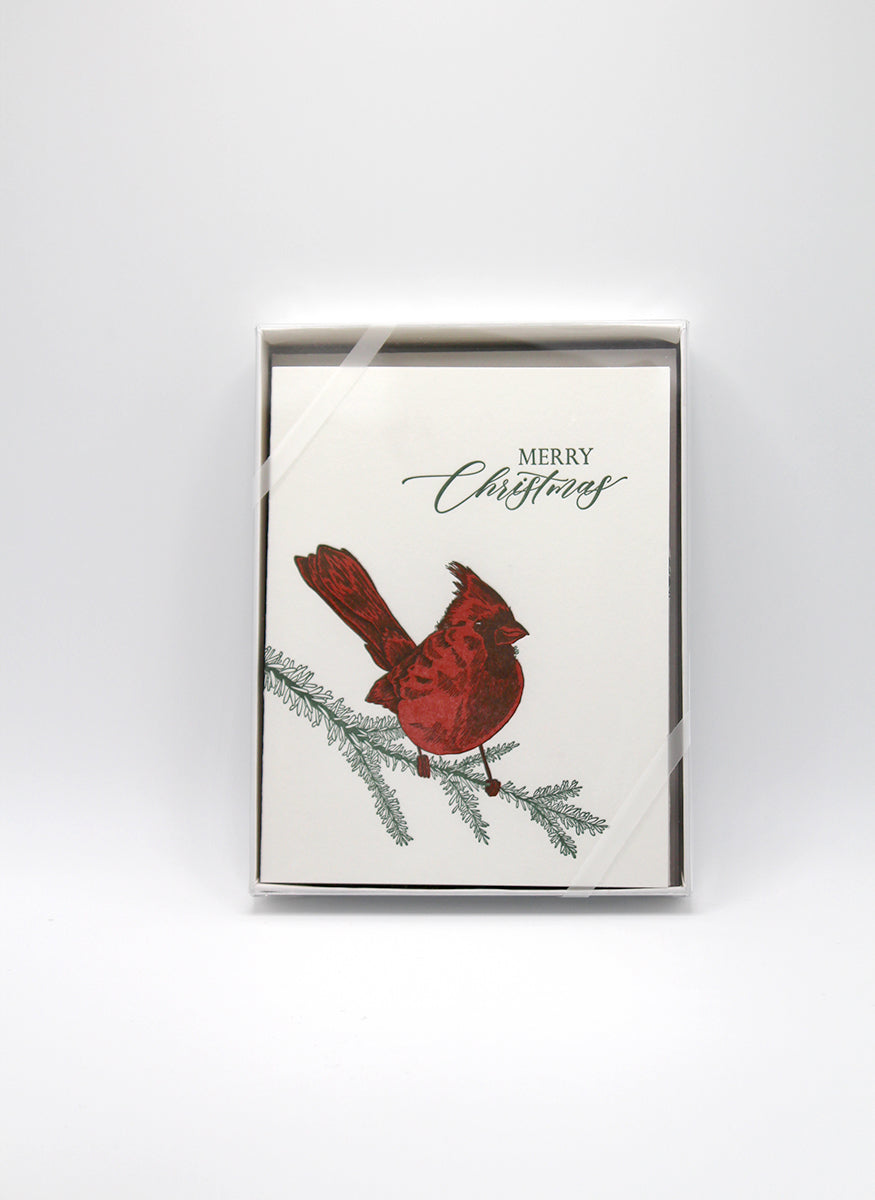 Boxed letterpress holiday card with a red cardinal that reads "merry christmas" by Rust Belt Love