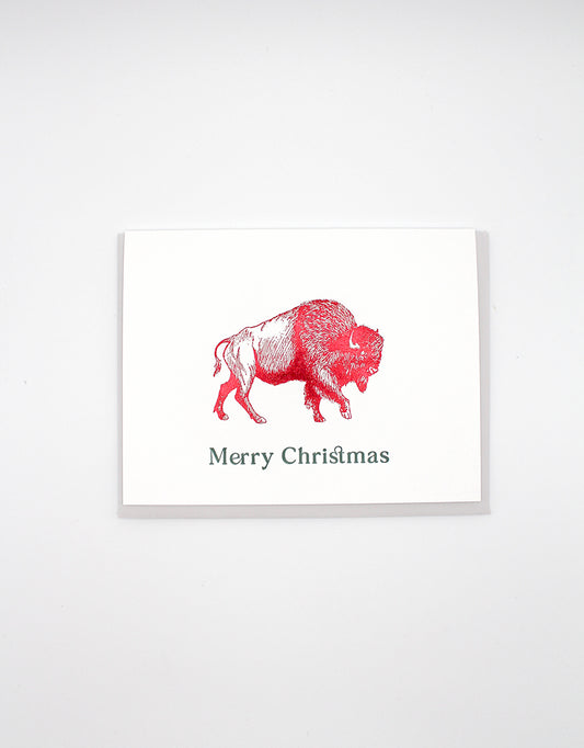 Red foil buffalo greeting card that reads "Merry Christmas" from Rust Belt Love