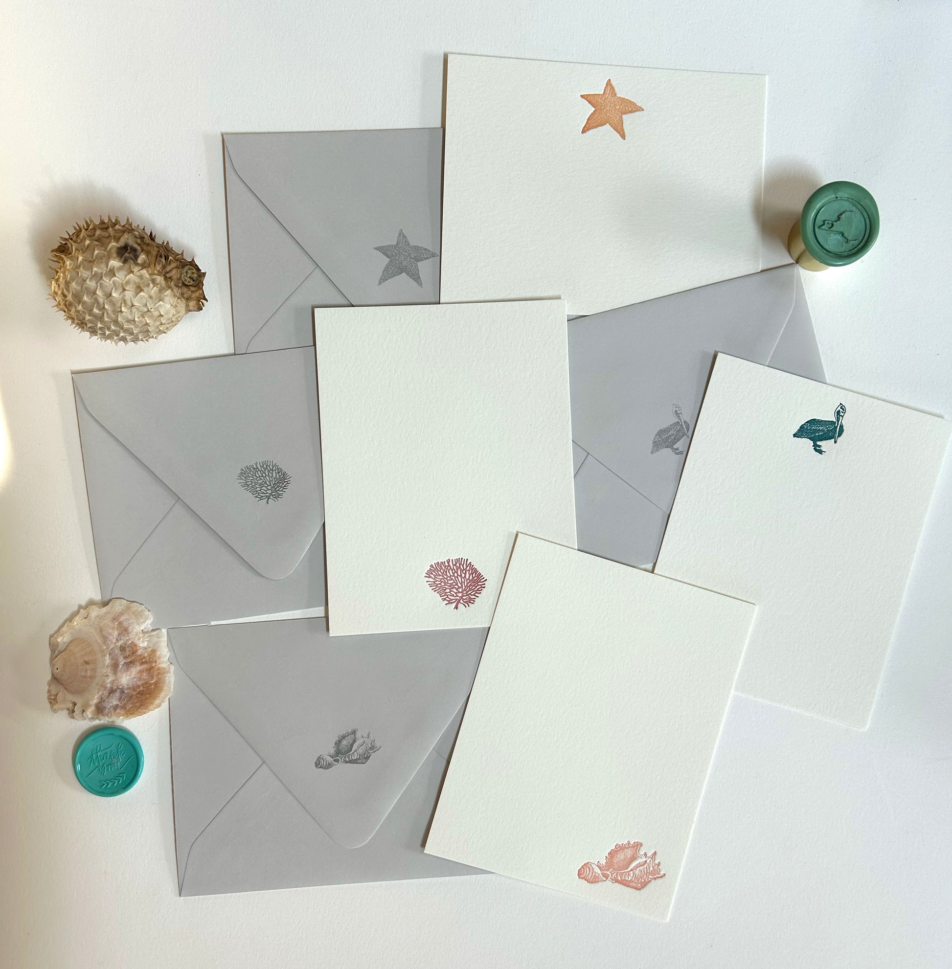 A variety of Rust Belt Love's seaside collection of flat note cards with matching envelopes