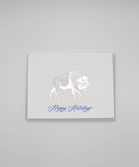 Silver foil buffalo holiday card that reads "happy holidays" by Rust Belt Love