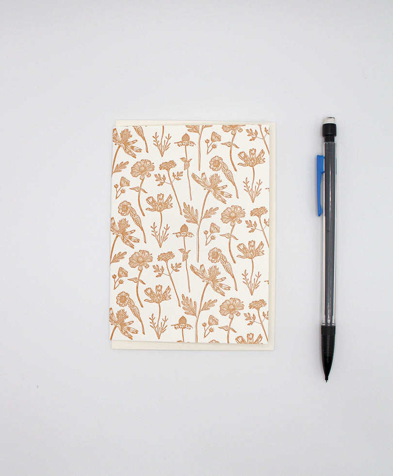 Letterpress orange wildflower small card by Rust Belt Love, shown with pencil for size reference